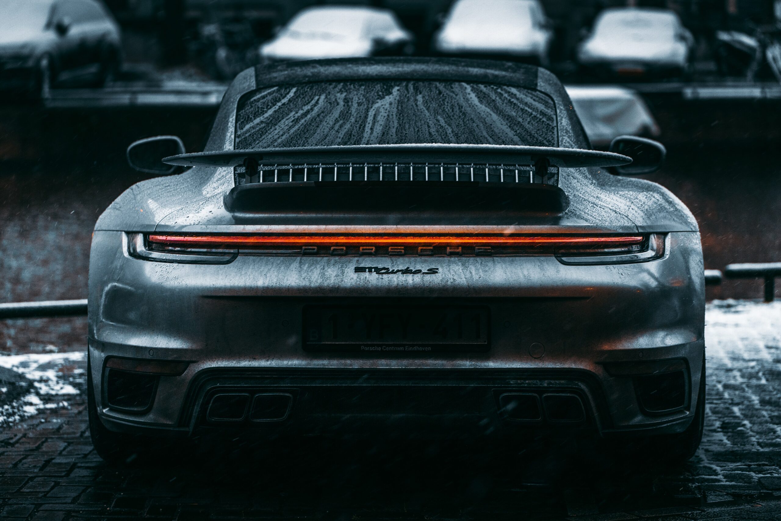 Silver Porsche 911 Turbo S in the Rain